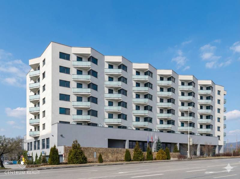 Apartment building on Rybničná Street in Bratislava - Vajnory with balconies and greenery.