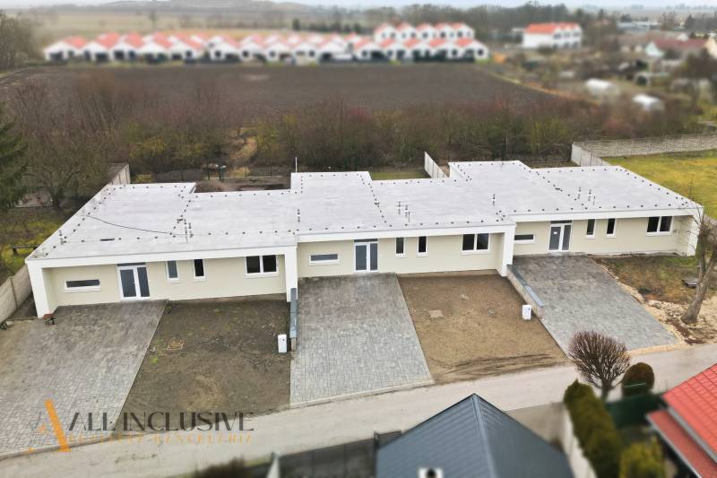 A family house in Čukárska Paka in Veľká Paka with yards and parking spaces.