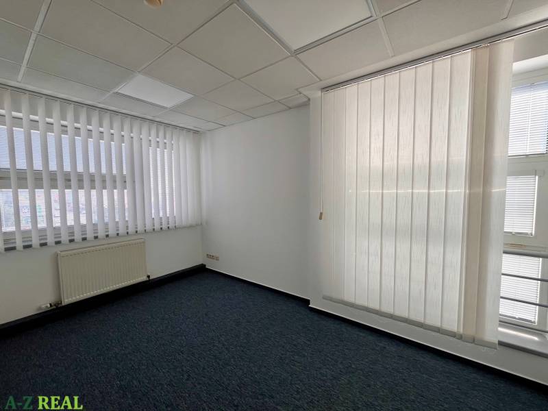 Offices with white blinds and dark carpet, Stará Vajnorská in Bratislava - Nové Mesto.