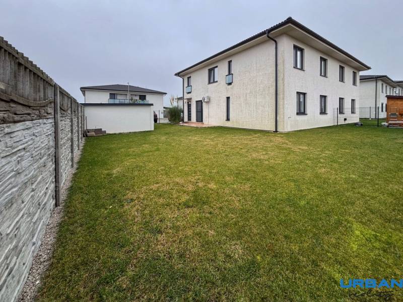 Exterior of a 3-room apartment on Kráľovianky Street in Kráľovianky with a lawn and a fence.