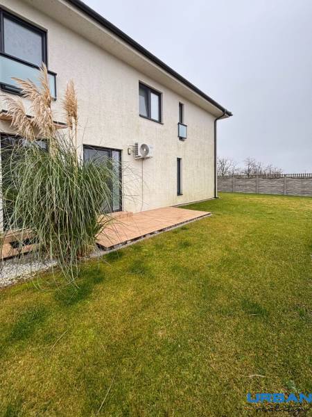 Exterior of a 3-room apartment on Kráľovianky Street in Kráľovianky with a garden and lawn.