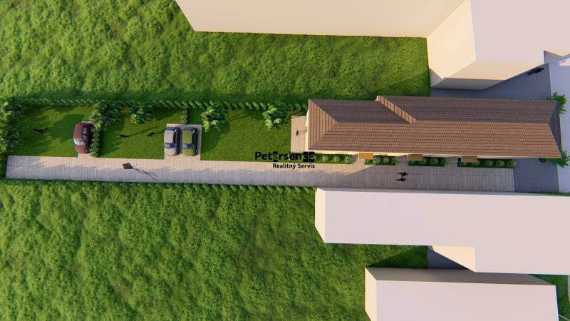 Aerial view of the access road, cars, and greenery near the 2-room apartment on Litoměřická Street in Topoľčianky.