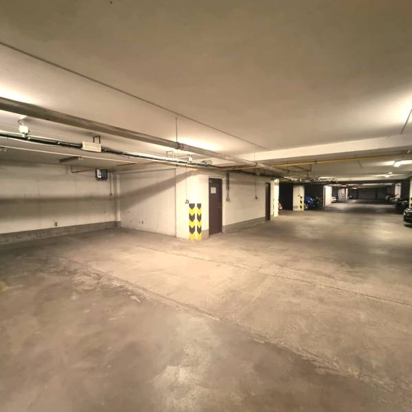 Parking garages with concrete flooring and lighting, Malacky, Malé námestie.