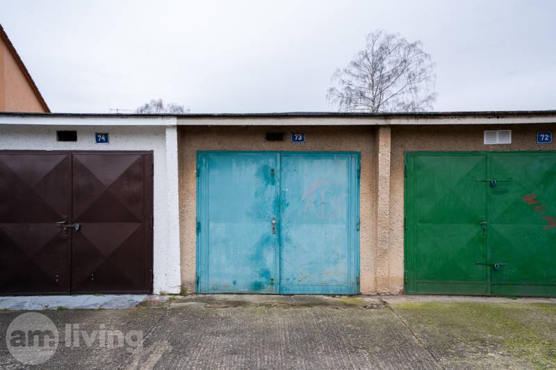 Colorful garage doors on Inovecká Street in Trenčín, various shades and textures.