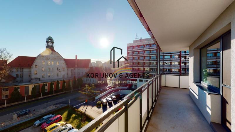 The balcony of a 2-room apartment with a view of a historic building on Strojárenská Street in Košice.
