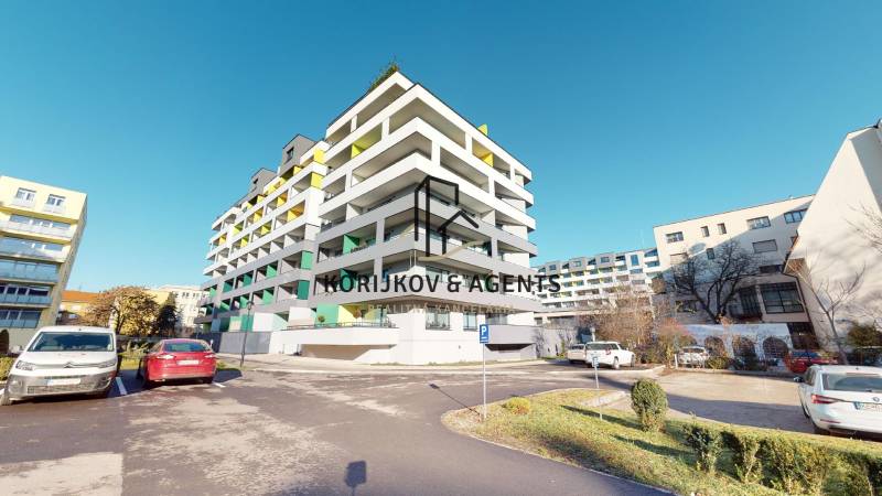 A new building with parking on Strojárenská Street in Košice, Old Town district.