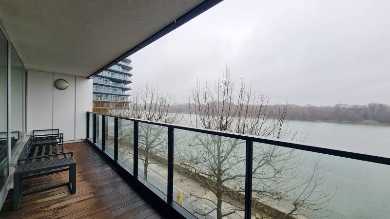 A balcony with a view of the river in Bratislava - Old Town, Dvořákovo nábrežie.