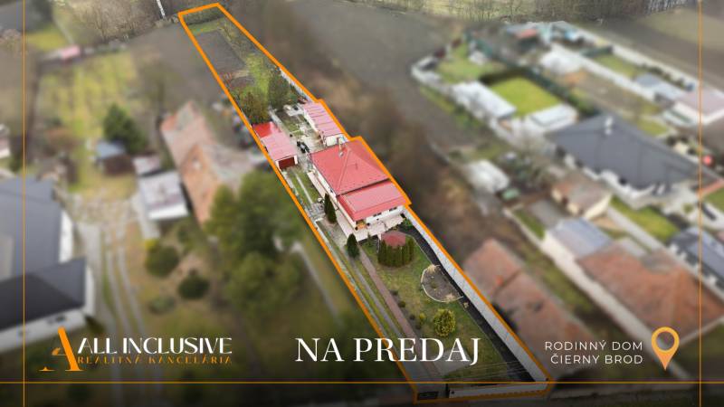 Aerial view of a family house in Čierny Brod with an adjacent plot for sale.