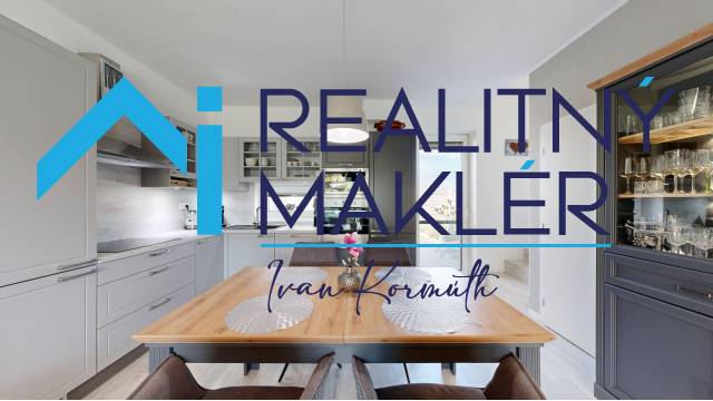 A kitchen in a family house with wood decor on the dining table.