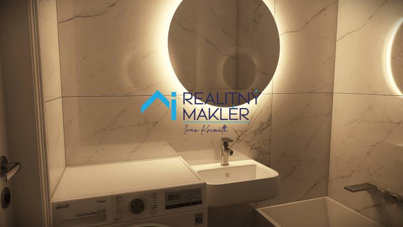 A bathroom in a 3-room apartment with light tiles and a washing machine.