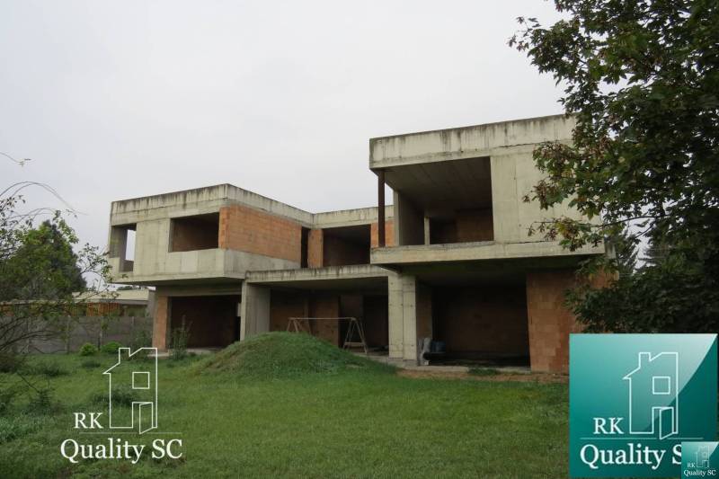 Unfinished family house on Kráľová Street near Senec - Záhumenská, Senec, surrounded by greenery.