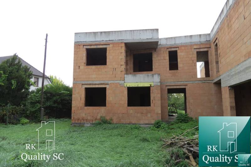 Under-construction family house on Záhumenská Street, Kráľová pri Senci, Senec, surrounded by greenery.
