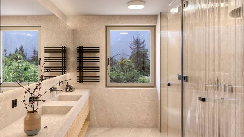 A bathroom in a 4-room apartment with natural lighting, a marble sink, and modern features.
