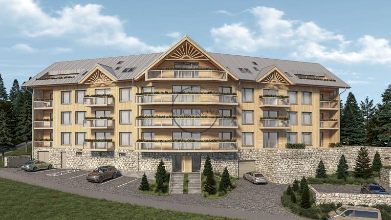 Recreational apartment in Donovaly with wooden decor, stone elements, and balconies on an Unspecified street.