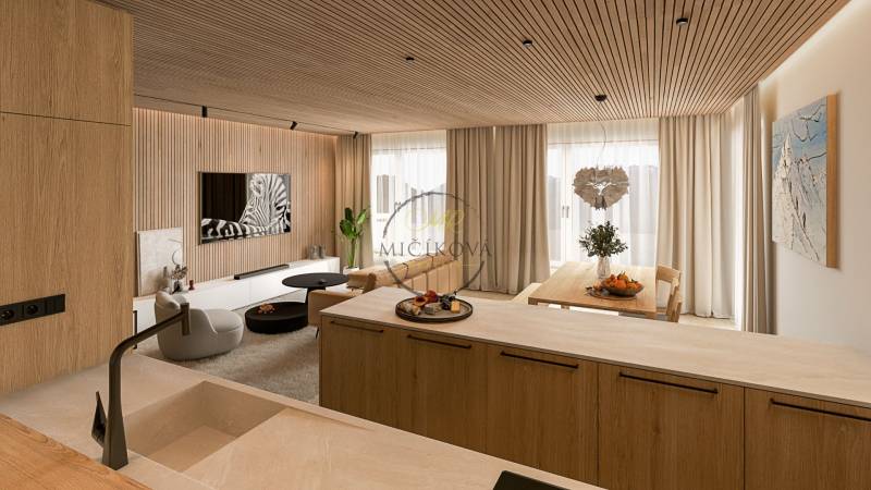 In the 4-room apartment, there is a kitchen with a dining area and a living section, with a wooden decor floor.