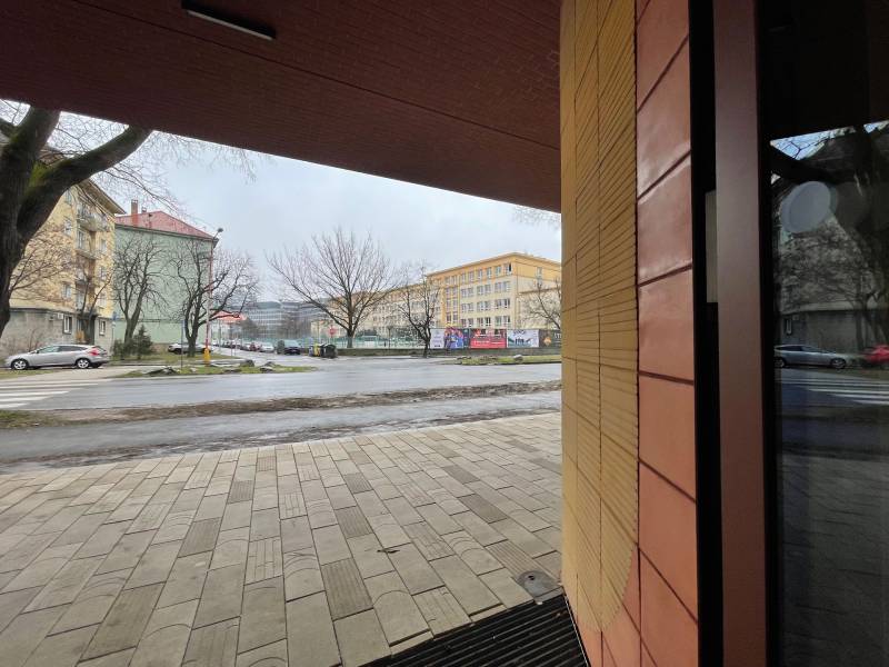 Street in Bratislava - Old Town near Košická with cars and a sidewalk.