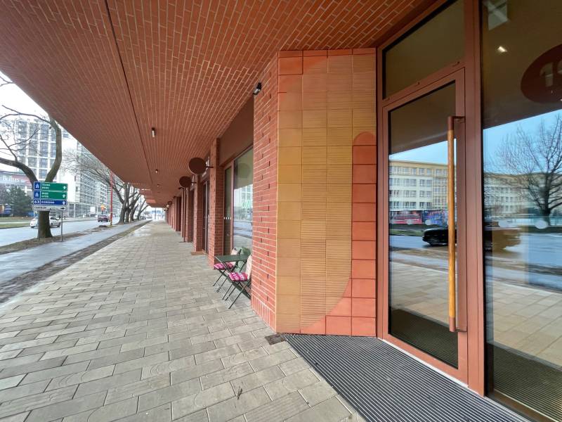 Sidewalk on Košická Street surrounded by brick buildings in Bratislava - Old Town.