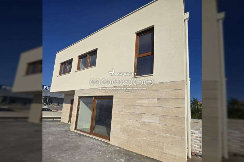 A family house in the city of Nin on Nin Street with large windows and bright walls.
