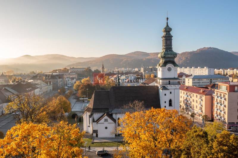Autumn panorama of the center of Zvolen with a church and surrounding buildings.