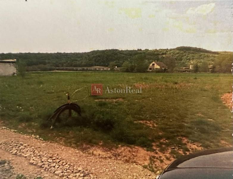 Lands - housing on Poľnohospodárska in Trenčín with a meadow and trees on the horizon.