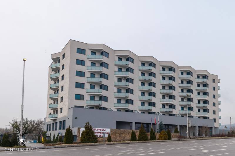 Apartment building on Rybničná Street in Bratislava - Vajnory, ground floor with wooden decor.