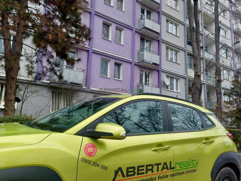 Cars of the company ABERTALrealit on Šalviová Street in front of a 2-room apartment in Bratislava - Ružinov.