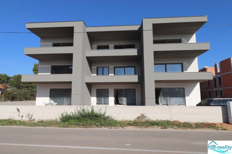 The exterior of a newly built holiday apartment in the town of Vodice with a modern facade.