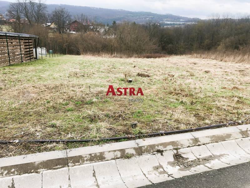 Land designated for residential use in Sokoľ, with a view of the surrounding landscape.