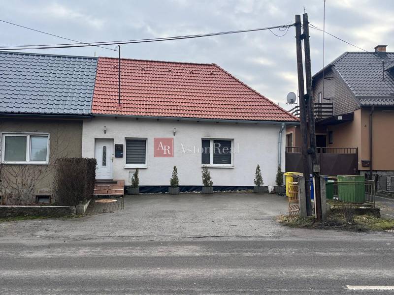 A family house on Osloboditeľov Street in Lieskovec with a sloped roof and a spacious yard.