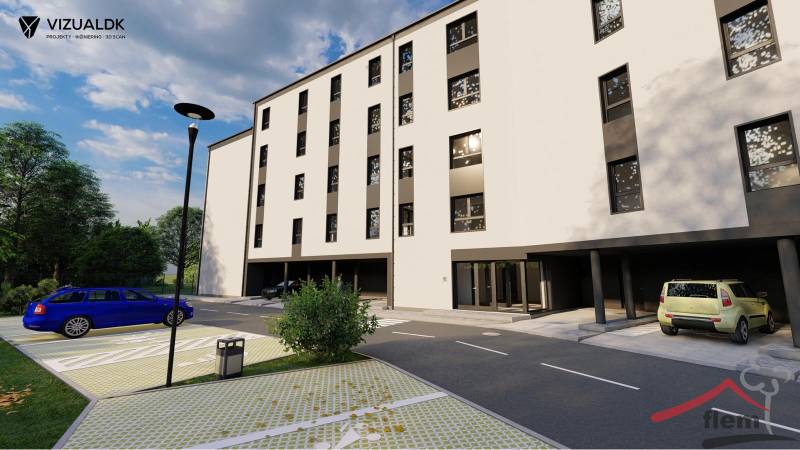 Exterior at the building on Moravská Street in Vráble, Commercial land with parking lot.