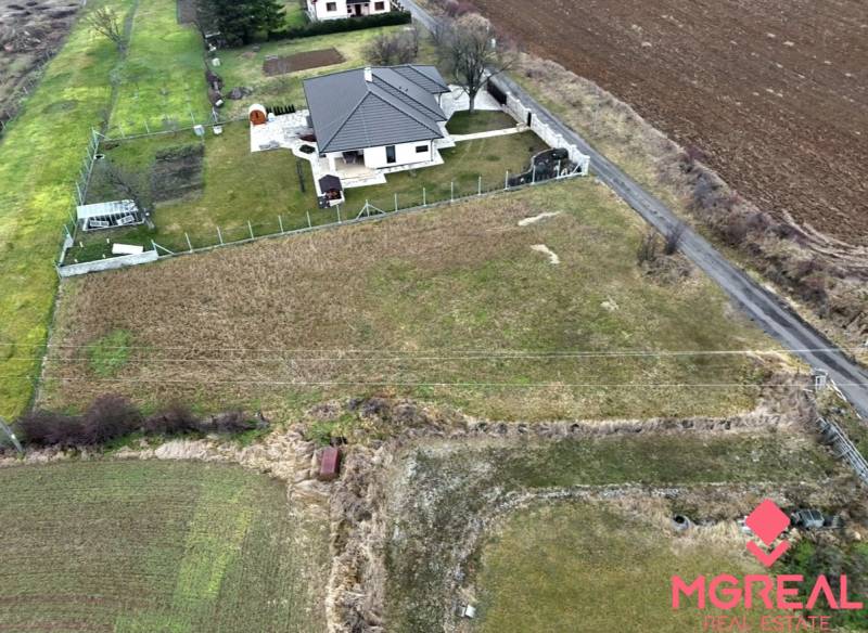 Aerial view of a house on a plot in Kuzmice on Tichá Street.