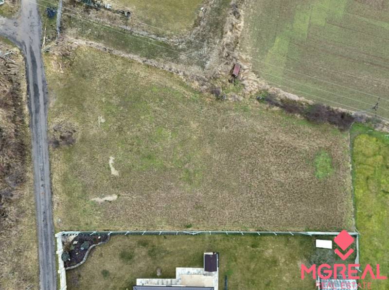 A plot suitable for living on a quiet street in Kuzmice, surrounded by nature.