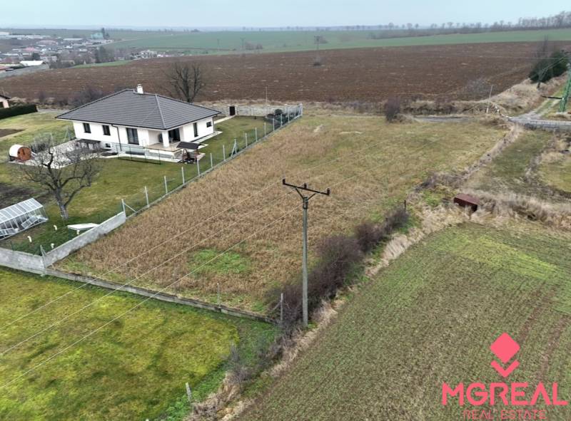 Residential plots in Kuzmice on Tichá Street with a view of the surrounding countryside.