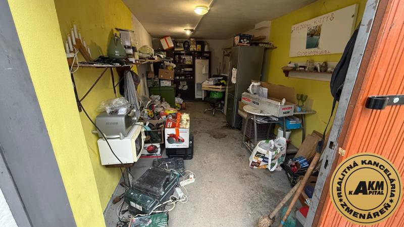 Mess in the workshop, aligned shelves, various tools and appliances in garages.