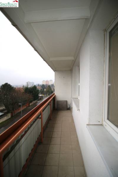 A balcony with a view of Kubačova Street in Bratislava - Rača, at a 3-room apartment.
