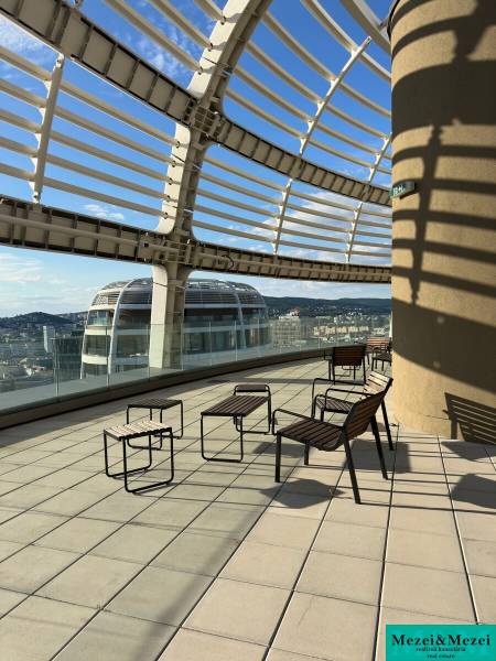 Terrace with a view of the city, stylish chairs and tables, terrace in Bratislava.