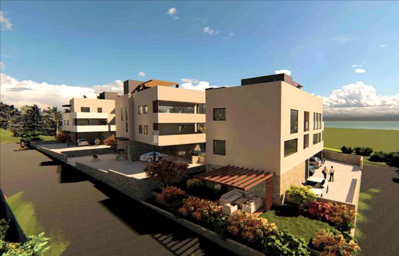 A modern apartment complex in Petrčane with garden areas and views of 2-bedroom apartments.
