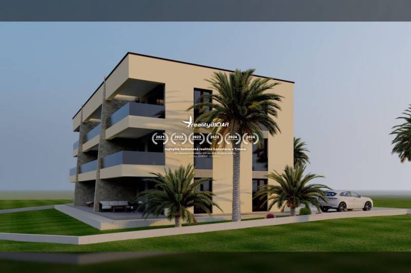 Modern building with palm trees and a parked car, suitable for a 2-room apartment.