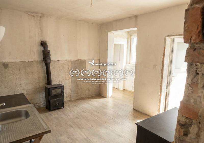 Interior of a family house with tiles and a wooden decor floor.