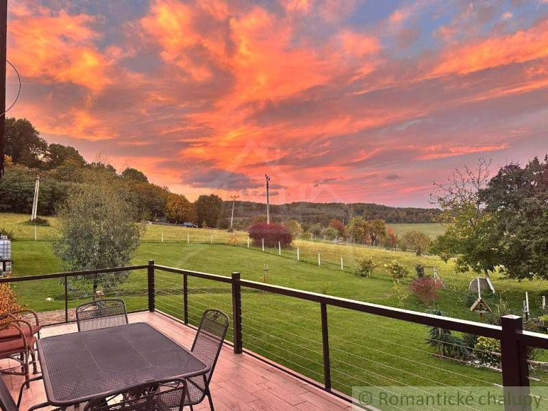 A family house in Lukovištia with a terrace and a view of the picturesque sunset.