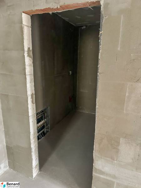 Construction space with entrance to a small room in a 3-room apartment.