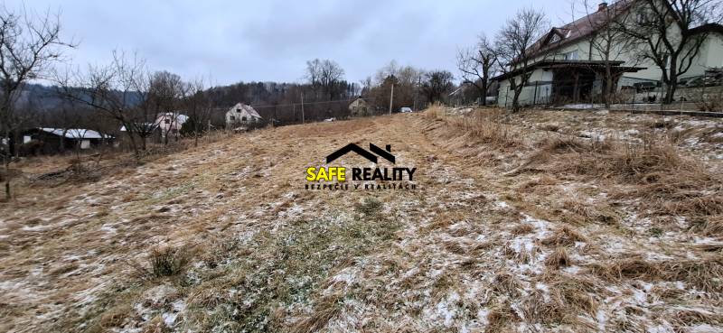 A snowy plot on the outskirts of Skalité, suitable for living with surrounding nature.