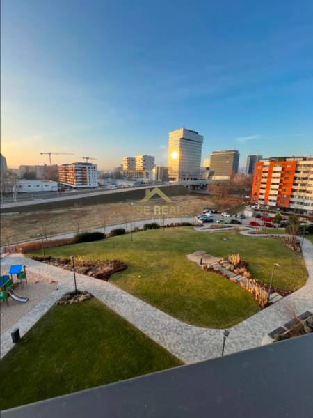 View from Bosákova to modern buildings and greenery in Bratislava - Petržalka, 2-room apartment.