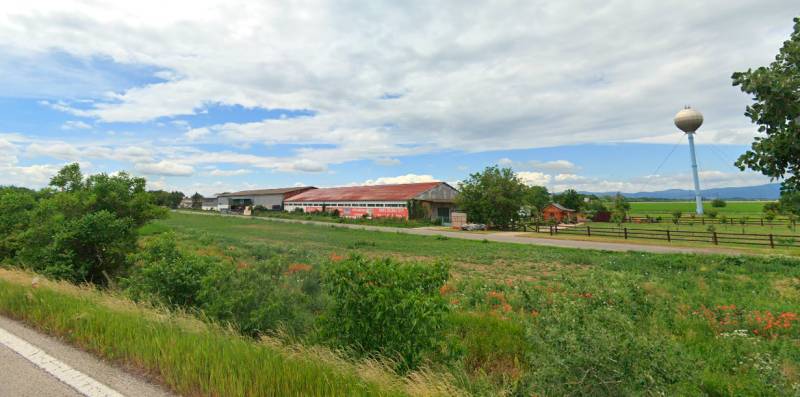 Landscape with a building and water tower on Družstevná Street, Blatné, Land - residential.
