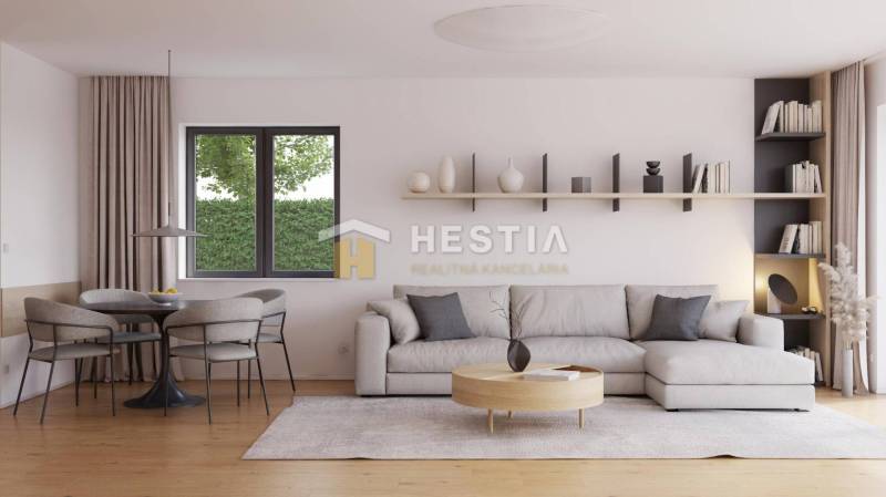 Living room in a family house with a comfortable couch and a dining area.