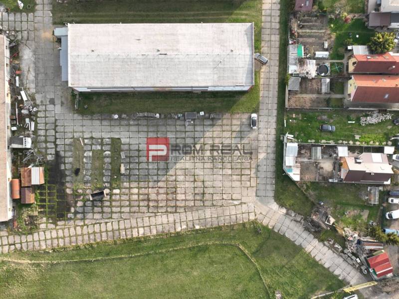 Aerial view of the production facilities on Pezinská Street in Vinosady with adjacent lands.