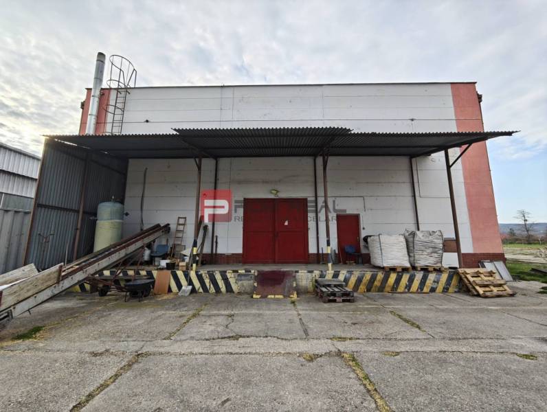 Production premises on Pezinská Street in Vinosady with an outdoor loading area.