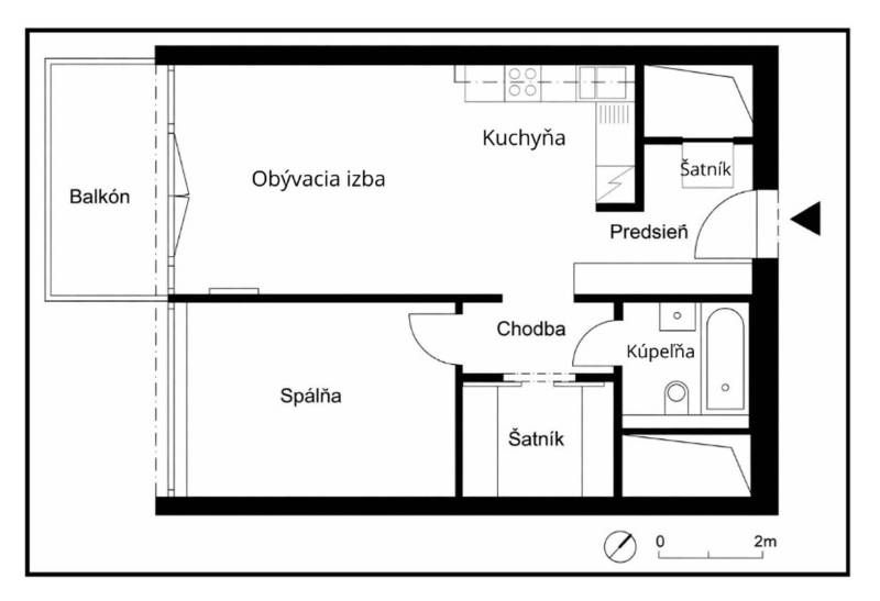 Floor plan of a 2-room apartment with a living room, kitchen, balcony, and closet.