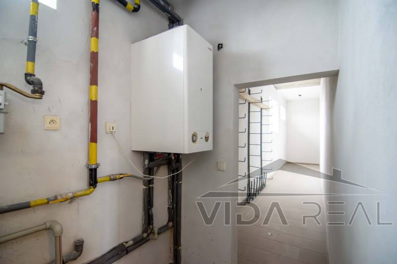 Interior with appliance and pipes in the spaces of warehouses and halls.