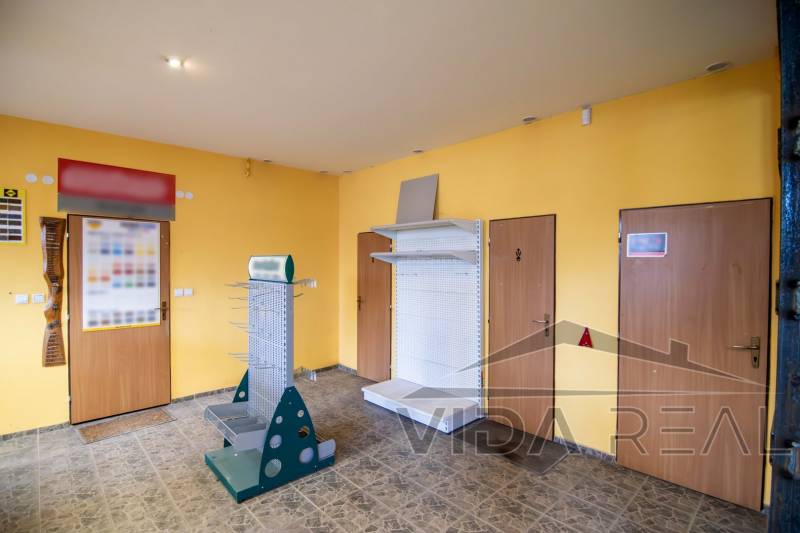 Space with yellow walls and metal racks in warehouses and halls.